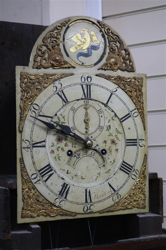 A late 18th century oak and mahogany eight day longcase clock, with painted arched and gilt brass dial